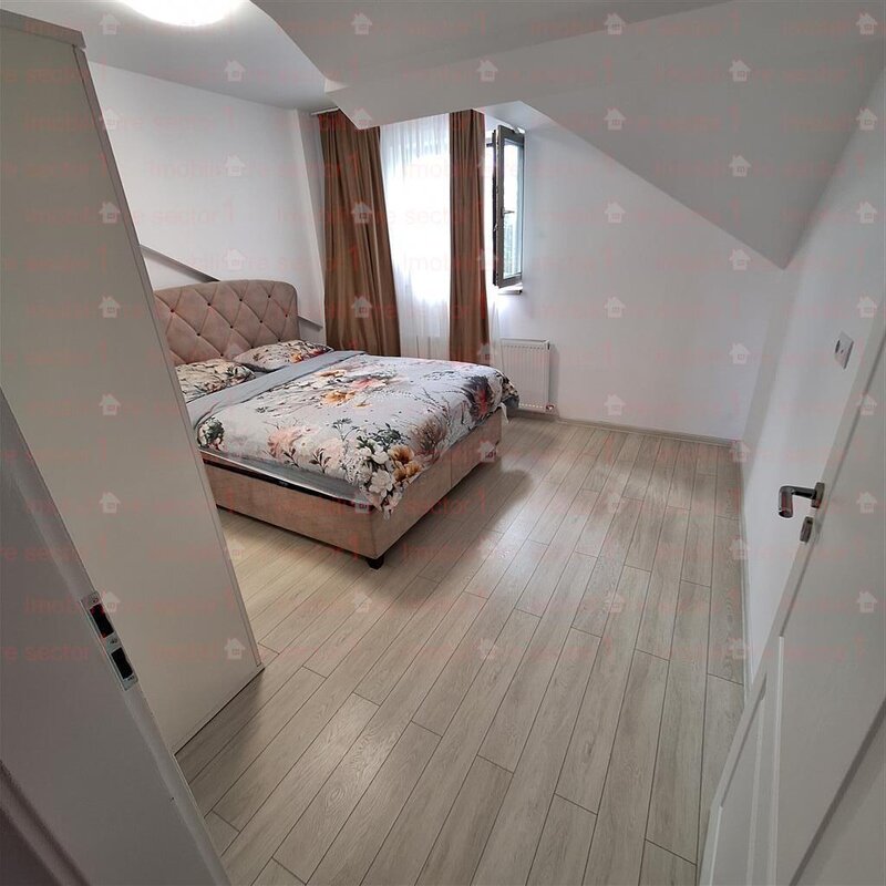 Bucurestii Noi, vand apartament 2 camere mansarda.